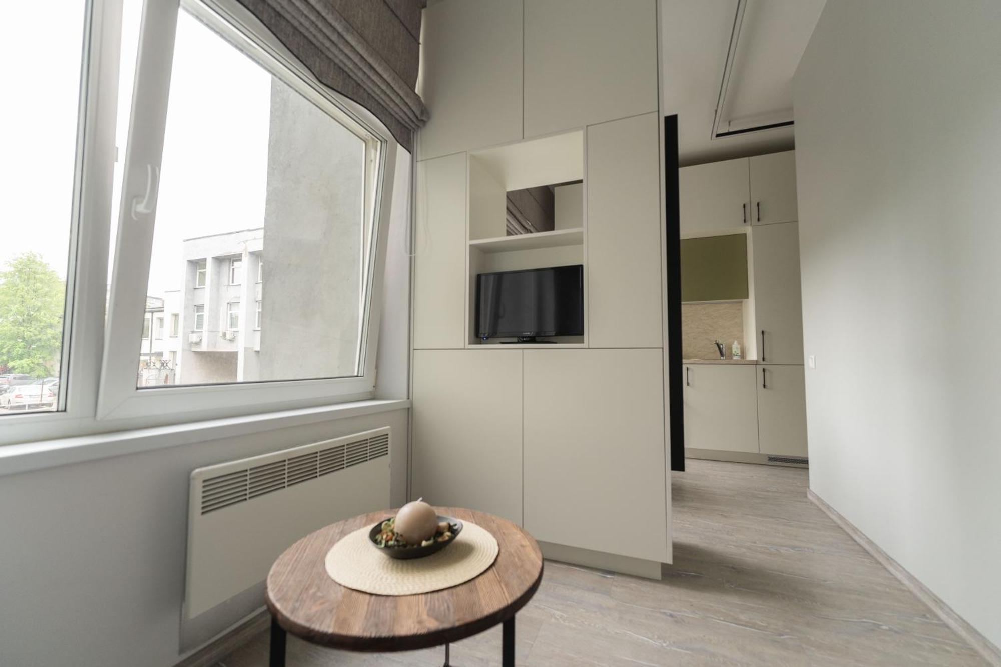 Апартаменты Cozy And Modern Loft Next To The Old Town Вильнюс